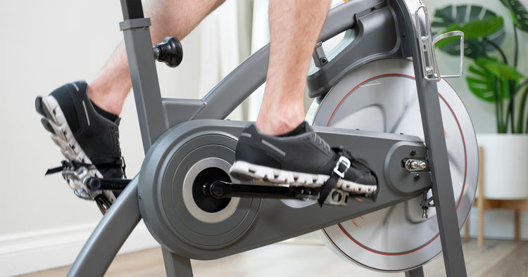 a person is cycling at home