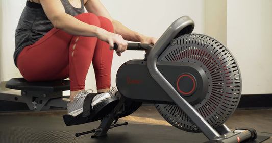 Sunny trainer rowing