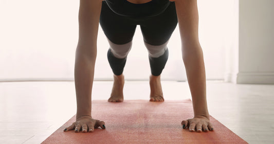 a woman is pushing up