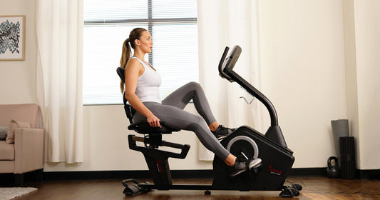 a person pedaling a recumbent bike