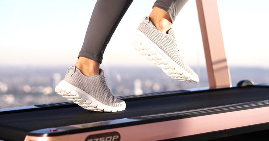 a woman running on treadmill