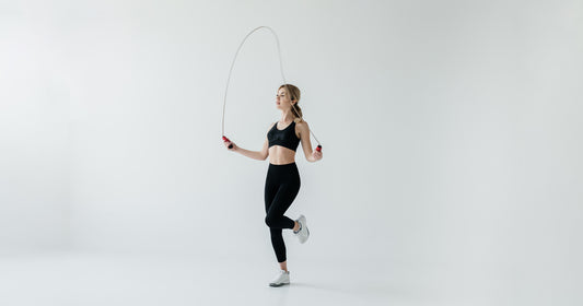 a lady is jumping rope