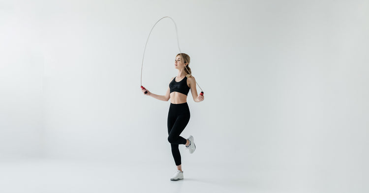 a lady is jumping rope