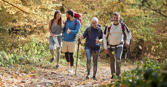 Group of people doing outdoor workouts - hiking