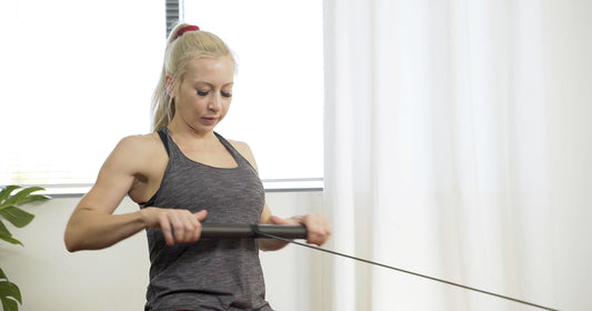 Sunny trainer rowing
