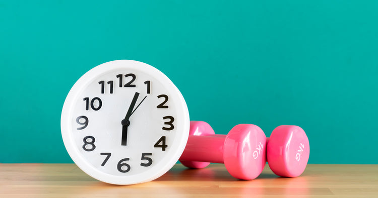 An alarm with two dumbbells
