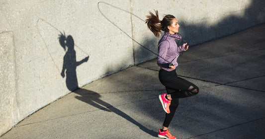 a woman is jumping rope