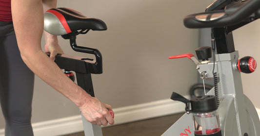 a person is adjusting Sunny bike