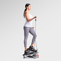 woman exerising on mini stepper
