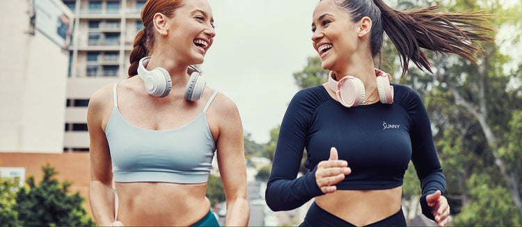 two women running outdoors