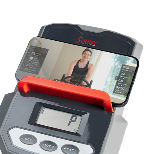 DEVICE HOLDER | Control your indoor workout entertainment as well as your learning experiences with the SunnyFit® app directly in front of you. The built-in device holder enables you to play your favorite movies or follow your favorite Sunny bike workout.