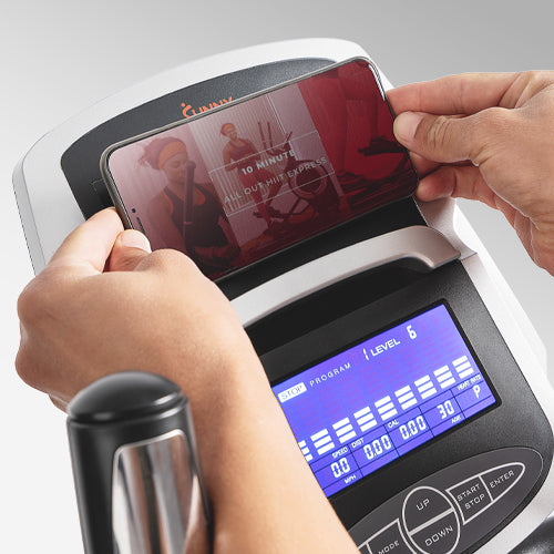 DEVICE HOLDER | Place your tablet, phone, or other mobile device to stay connected. Follow along online with our Sunny Health & Fitness trainers for certified fitness tips, advice, and lessons.